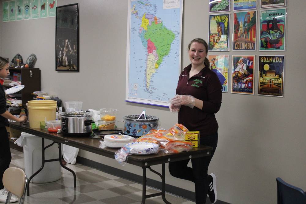 Ms. Montgomery serves tacos to Spanish club